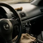 Comment nettoyer un tableau de bord de voiture : microfibre et produit pour un fini sans traces